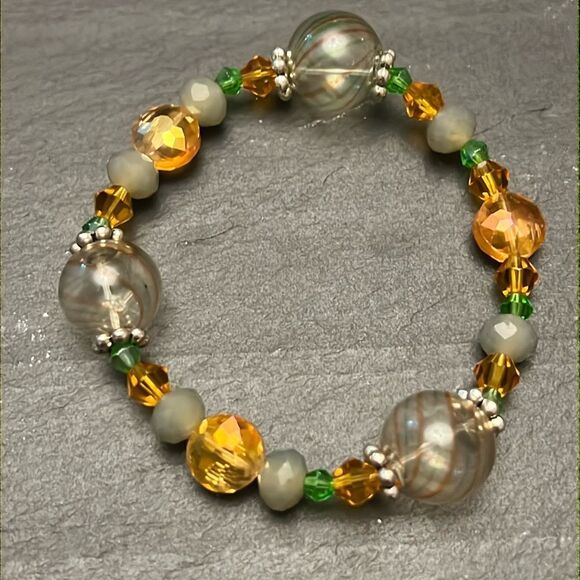 Hand Crafted Jewelry - Handcrafted beaded bracelet with metal bead detail